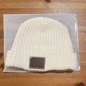 Cream Knit Beanie with Brown Patch
